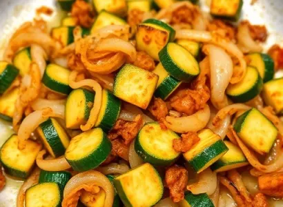 Courgettes et oignons frits