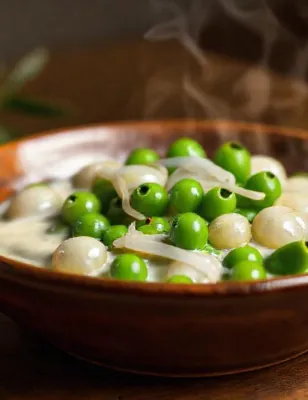 Petits pois à la crème et oignons grelots